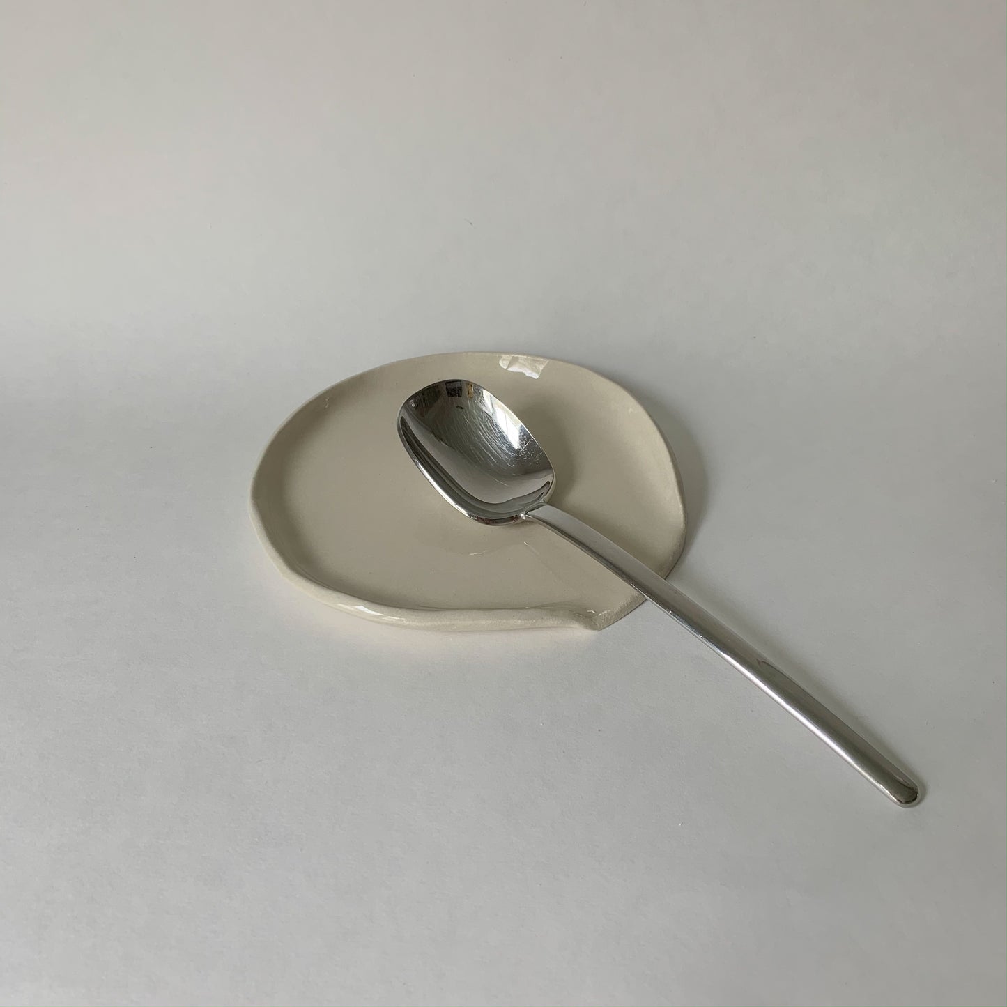 Circular spoon rest